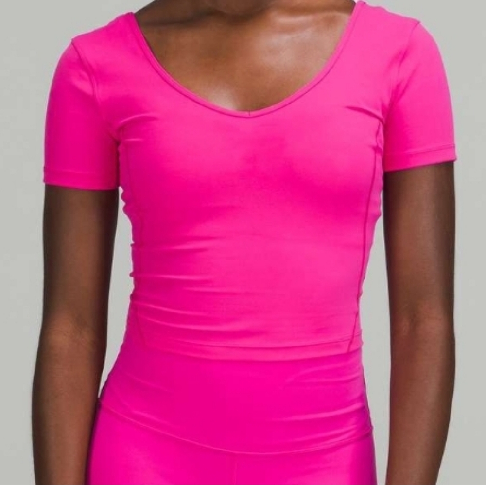 Lululemon Athletica Fitted Pink Bodysuit Top